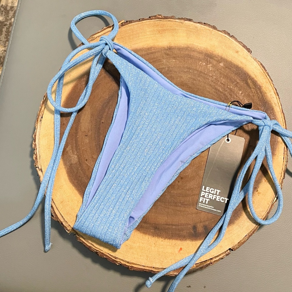 New ONEONE Ariel shimmer light blue string bikini bottom sz S stretch ribbed